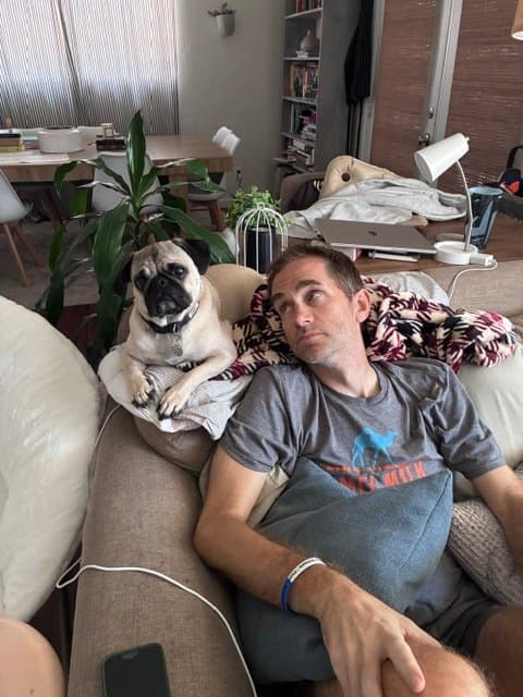 A guy and his lap dog...